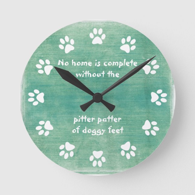 No home is complete-Paw Print-Teal Round Clock (Front)