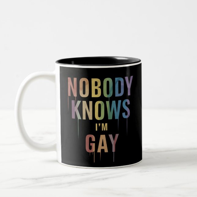 Nobody Knows I'm Gay Funny LGBT Gay Pride Two-Tone Coffee Mug (Left)