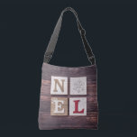 NOEL Crafty Christmas Snowflake Crossbody Bag<br><div class="desc">NOEL
Perfect for the crafty way to celebrate Christmas.  With faux wood grain background and nice neutral colours.</div>