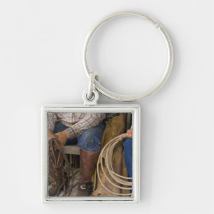 North America, USA. Cowboys relaxing and 2 Key Ring