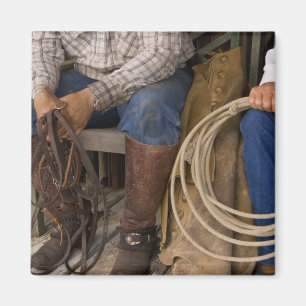 North America, USA. Cowboys relaxing and 2 Magnet