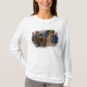 North America, USA. Cowboys relaxing and 2 T-Shirt