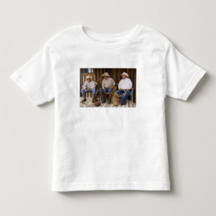 North America, USA. Cowboys relaxing and Toddler T-Shirt