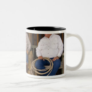 North America, USA. Cowboys relaxing and Two-Tone Coffee Mug