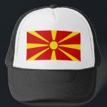 north macedonia trucker hat<br><div class="desc">The flag of North Macedonia depicts a stylised yellow sun on a red field,  with eight broadening rays extending from the centre to the edge of the field. It was created by Miroslav Grčev and was adopted on 5 October 1995.</div>
