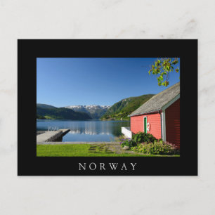 Norwegian fjord and boathouse black postcard