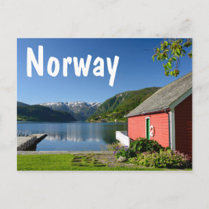 Norwegian fjord view with red boathouse postcard