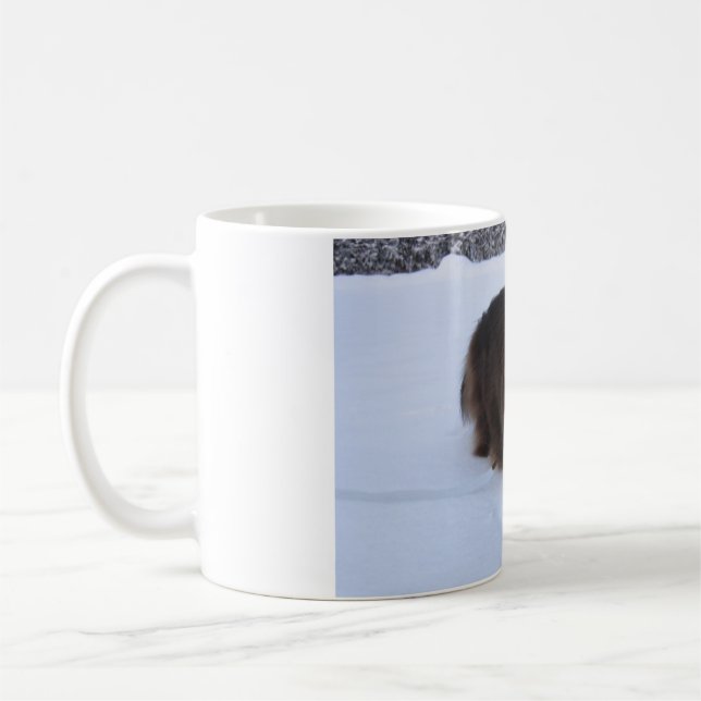 norwegian forest cat in snow coffee mug (Left)
