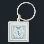 Not another wedding anniversary key ring<br><div class="desc">A funny design for a married couple whose wedding anniversaries seem to come round very quickly. This design has a lace-style frame drawn around the text not another wedding anniversary. The design features a wedding ring and flowers. A funny wedding anniversary design.</div>