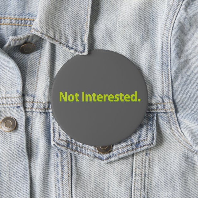 Not Interested. Green Text Grey BG 10 Cm Round Badge (In Situ)