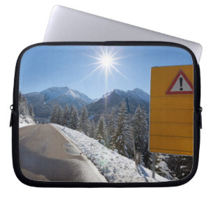notice board on a winter road, snow covered laptop sleeve