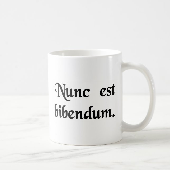 Now we must drink. coffee mug (Right)