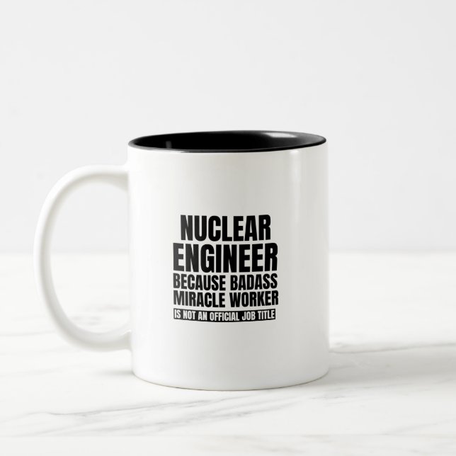 Nuclear engineer because badass miracle worker is Two-Tone coffee mug (Left)