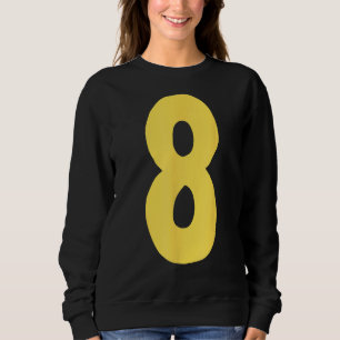Number 8 big and bold in yellow sweatshirt