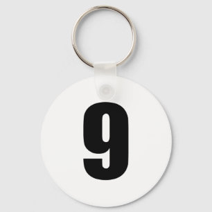 number 9 in black on white button keychain
