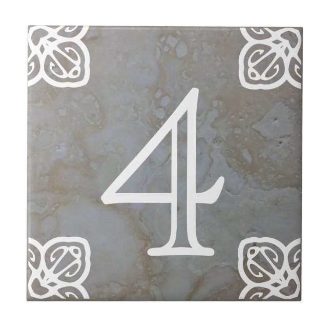 Number Tile - Spanish White on limestone (Front)