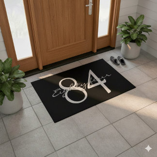 Numerical and text on black background doormat