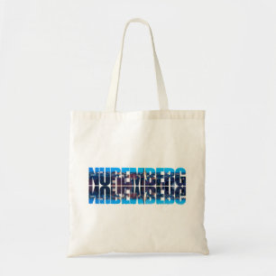 Nuremberg text composed of night old town view tote bag