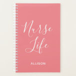 Nurse Life Medical Pink and White Personalised Planner<br><div class="desc">Keep up with your busy schedule in style with this Nurse Life Medical Pink and White Personalised Planner. It is a modern design with the text "nurse life" in big white trendy hand lettered script centred on the front of coral pink customisable planner. Name is across lower front. Click personalise...</div>