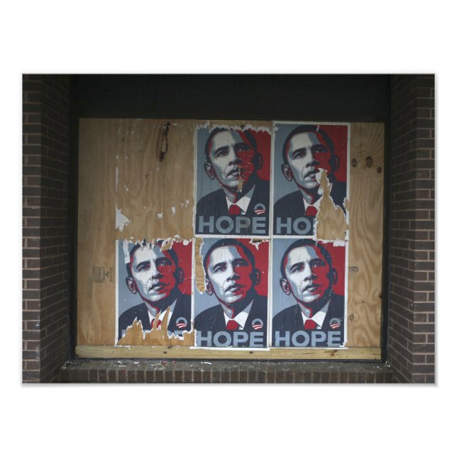 Obama signs in a boarded window of a closed (Front)