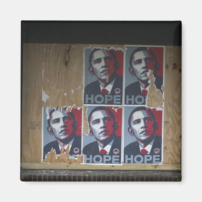 Obama signs in a boarded window of a closed magnet (Front)