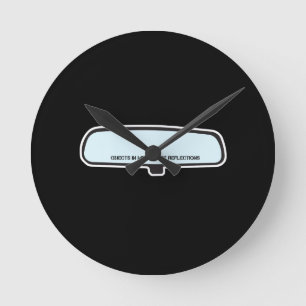 Objects In Mirror Are Reflected Round Clock