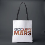 Occupy Mars Canvas Tote – Bold Statement for Futur<br><div class="desc">Make a fearless statement with this "Occupy Mars" canvas tote bag – a perfect blend of patriotism and vision. Designed for those who believe in a future beyond Earth, this bag symbolises innovation, curiosity, and ambition. The American flag-inspired text adds a bold and stylish flair. Ideal for everyday use, this...</div>