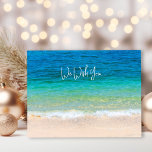 Ocean Beach Wish You Merry Christmas Holiday Postcard<br><div class="desc">Christmas postcards with ocean and beach scene.  Customise with your greeting and signature.  Tropical blue water and beach sand on the front with sample text,  "we wish you" (change wording to "I" as needed).  The wording continues onto the back with a "Merry Christmas" and "Happy New Year" greeting.</div>