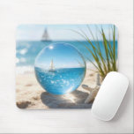 Ocean Reflection in a Lens Ball Mouse Pad<br><div class="desc">A sailboat on a sunlit ocean, its reflection captured in a glass lens ball on beach sand next to a starfish</div>