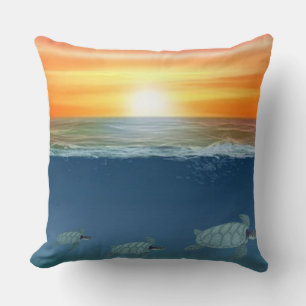 Ocean sunrise and swimming turtles cushion