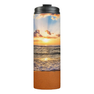 Ocean sunrise, deep blue horizon. thermal tumbler
