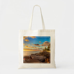 Ocean Sunset Over Rocks And Palm   O'Ahu Tote Bag
