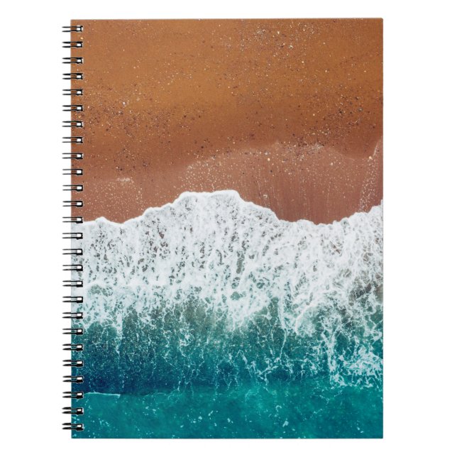 Ocean wave on a sandy beach, background  top view  notebook (Front)