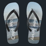 Ocean Waves Cape May New Jersey Thongs<br><div class="desc">Pretty Blue Sky with Light Fluffy White Clouds, Blue Sea, Crashing Ocean Waves and Beach Sand at Cape May, New Jersey fun Unisex Flip Flops. Shown with Wide Black Straps and Black Footbed. See options for flip flops in Slim Straps for more strap colours. Perfect for your summertime fun, trips...</div>