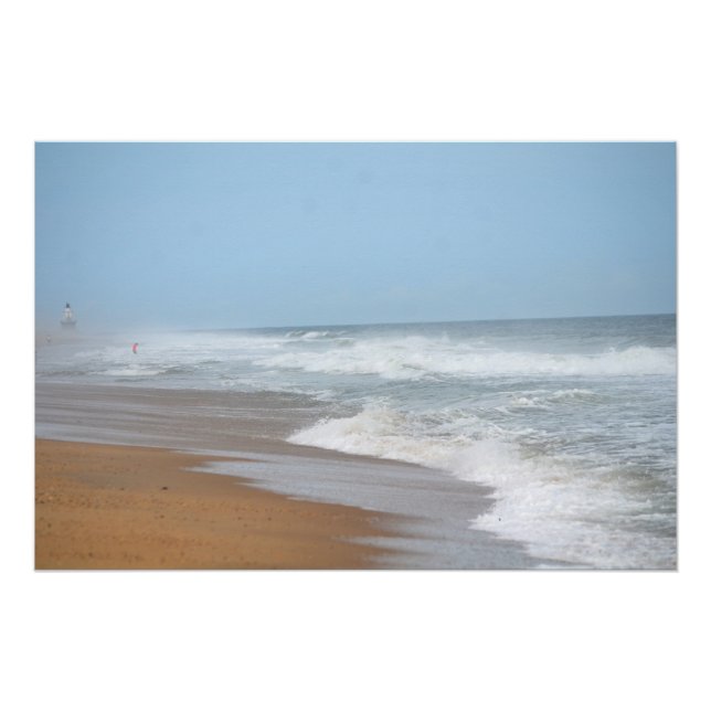 Ocean waves crashing on the beach by lighthouse poster (Front)