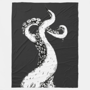 octopus tentacles on black blanket