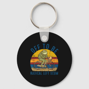 Off to be radical left scum frog riding bicycle key ring