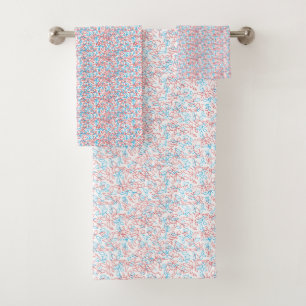 Off-white textured background with subtle, fine, l bath towel set