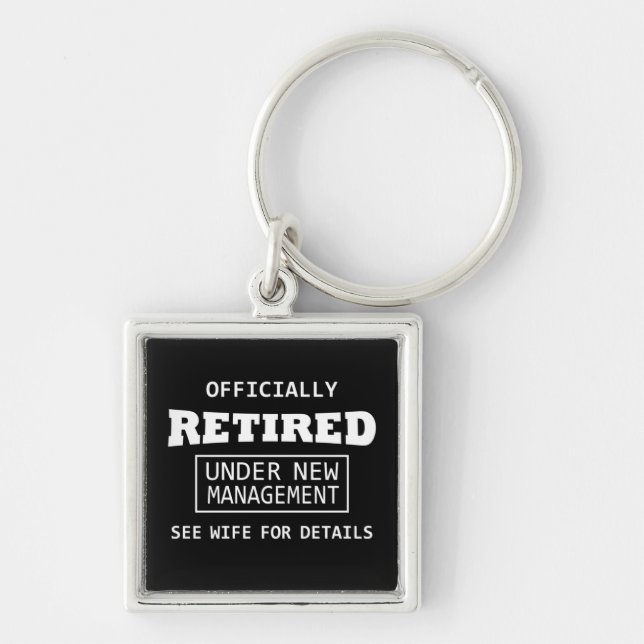 officially retired under new management key ring (Front)