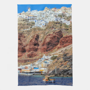 Oia village on Santorini island, north, Greece Tea Towel