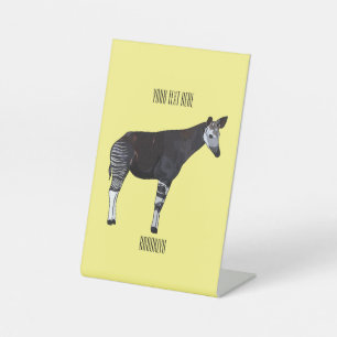 Okapi cartoon illustration pedestal sign