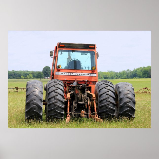 Old 4 Rear Tired Tractor Sitting In A Field Poster (Front)