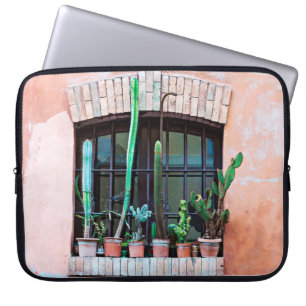 Old abandoned window with group of cactus flower p laptop sleeve