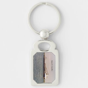 old Adam E. Cornelius metal key chain