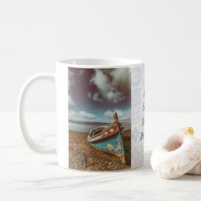 Old Aiola. Portuguese traditional boat in a beach Coffee Mug (With Donut)