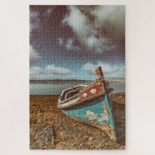 Old Aiola. Portuguese traditional boat in a beach Jigsaw Puzzle
