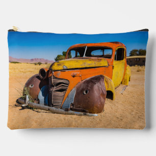Old and abandoned car in Solitaire, Namibia Accessory Pouch