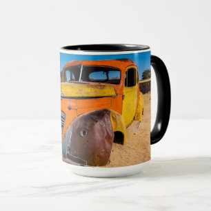 Old and abandoned car in Solitaire, Namibia Mug