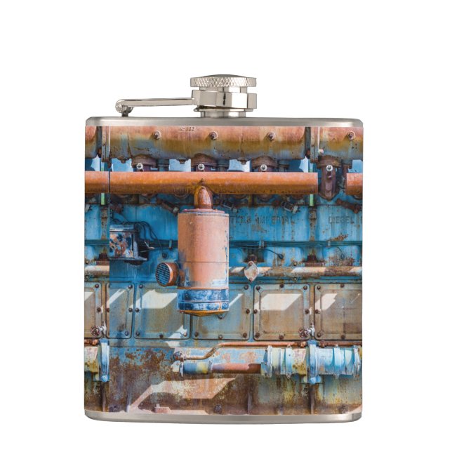 Old and rusty Atlas Imperial diesel engine at Inde Hip Flask (Front)