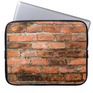 Old and vintage red brick wall texture backgrounda laptop sleeve